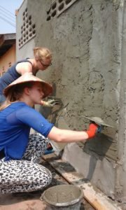 helping to render walls construction volunteer placements