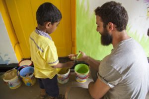 volunteers refurbishing a school in sri lanka