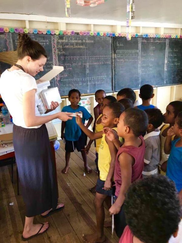 Jess at the school helping the kids