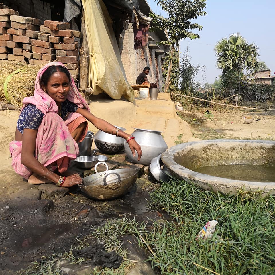 local woman washing on IVI project in India