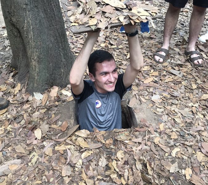Cu Chi Tunnels - Going into a hidden tunnel (2)