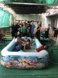 kids in pool at special needs home