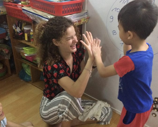 High five with kids-Ho Chi Minh