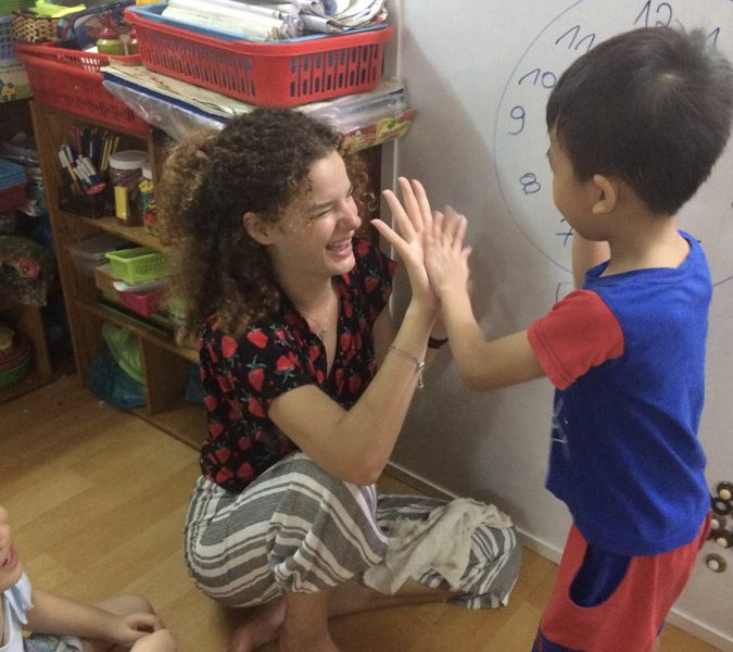 High five with kids-Ho Chi Minh