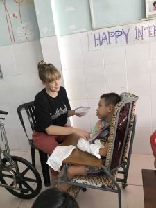 Participant feeding a child (1)