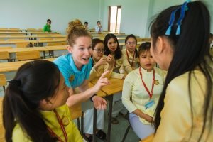 _Participant talking with students