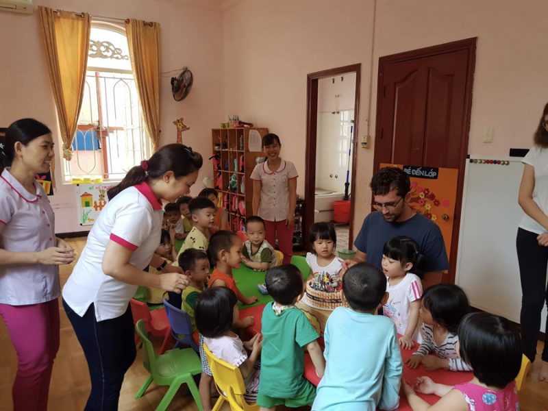 Serving a cake to the kids-Ho Chi Minh
