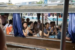 Volunteers are on the local boat