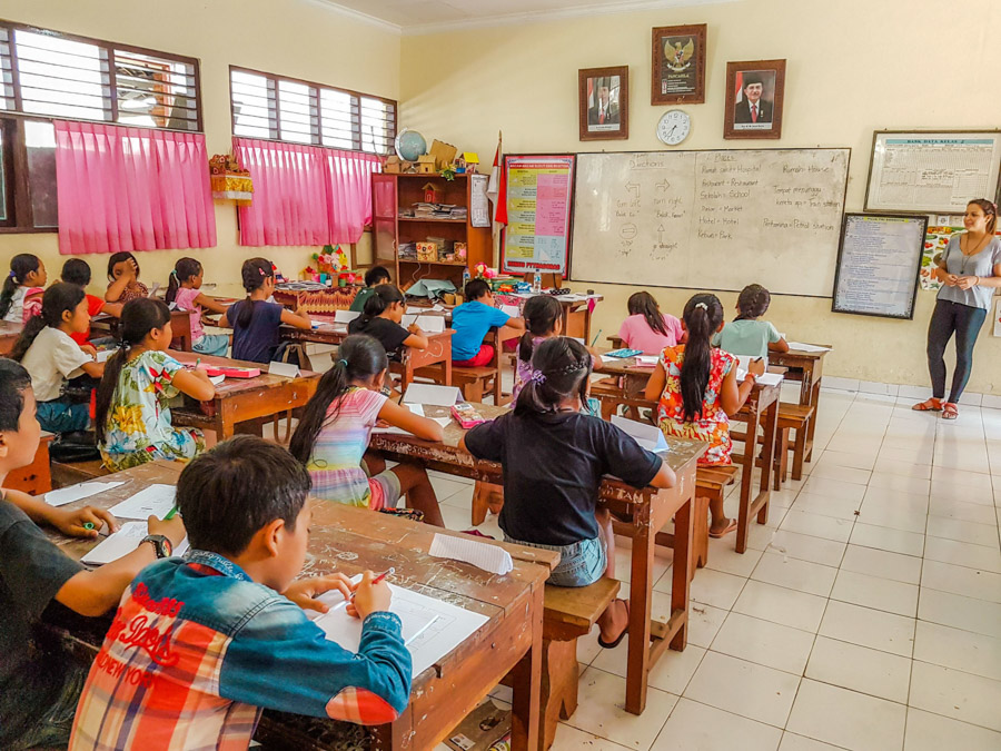 children at classroom desks working