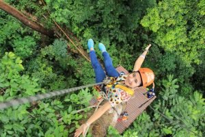 woman-wearing-orange-helmet-on zipline