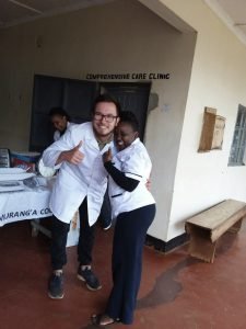 Doctor and coordinator taking a photo