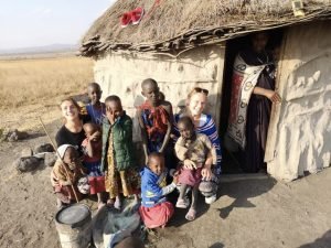 Group photo with the Maasai kids and IVI volunteers