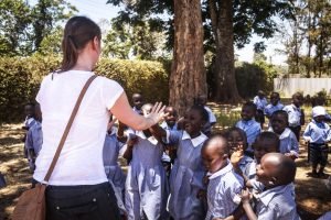 Participant playing with kids