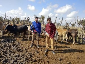 Participant milking the cows in Moita Masai village