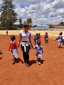 Participant playing with kids