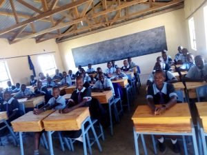 Student sit on their desk