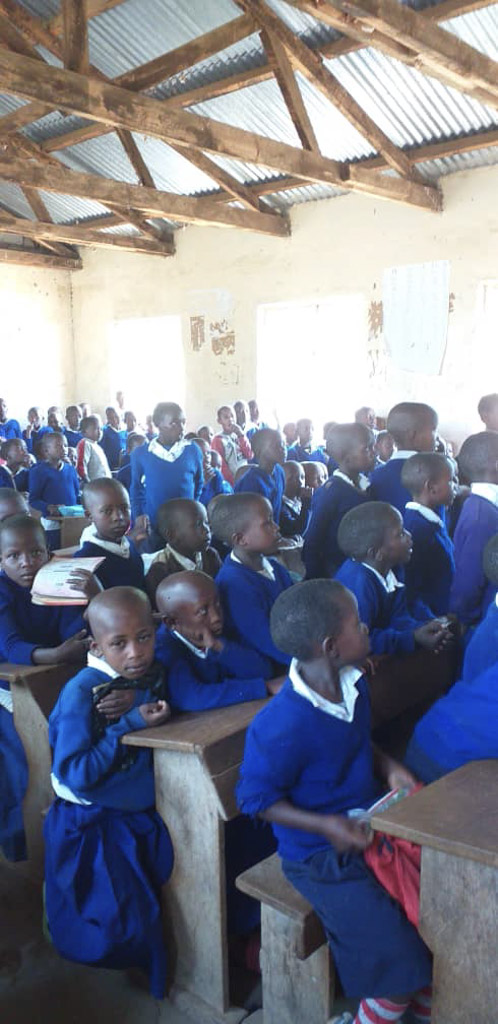 Students sit on their desk