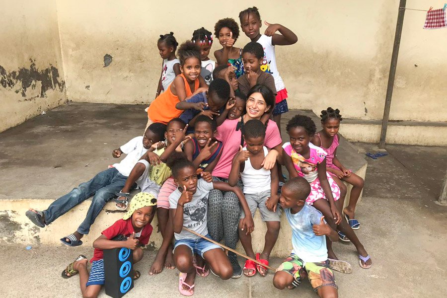 posing with group of kids