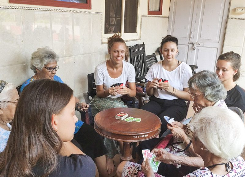 playing uno at elderly home