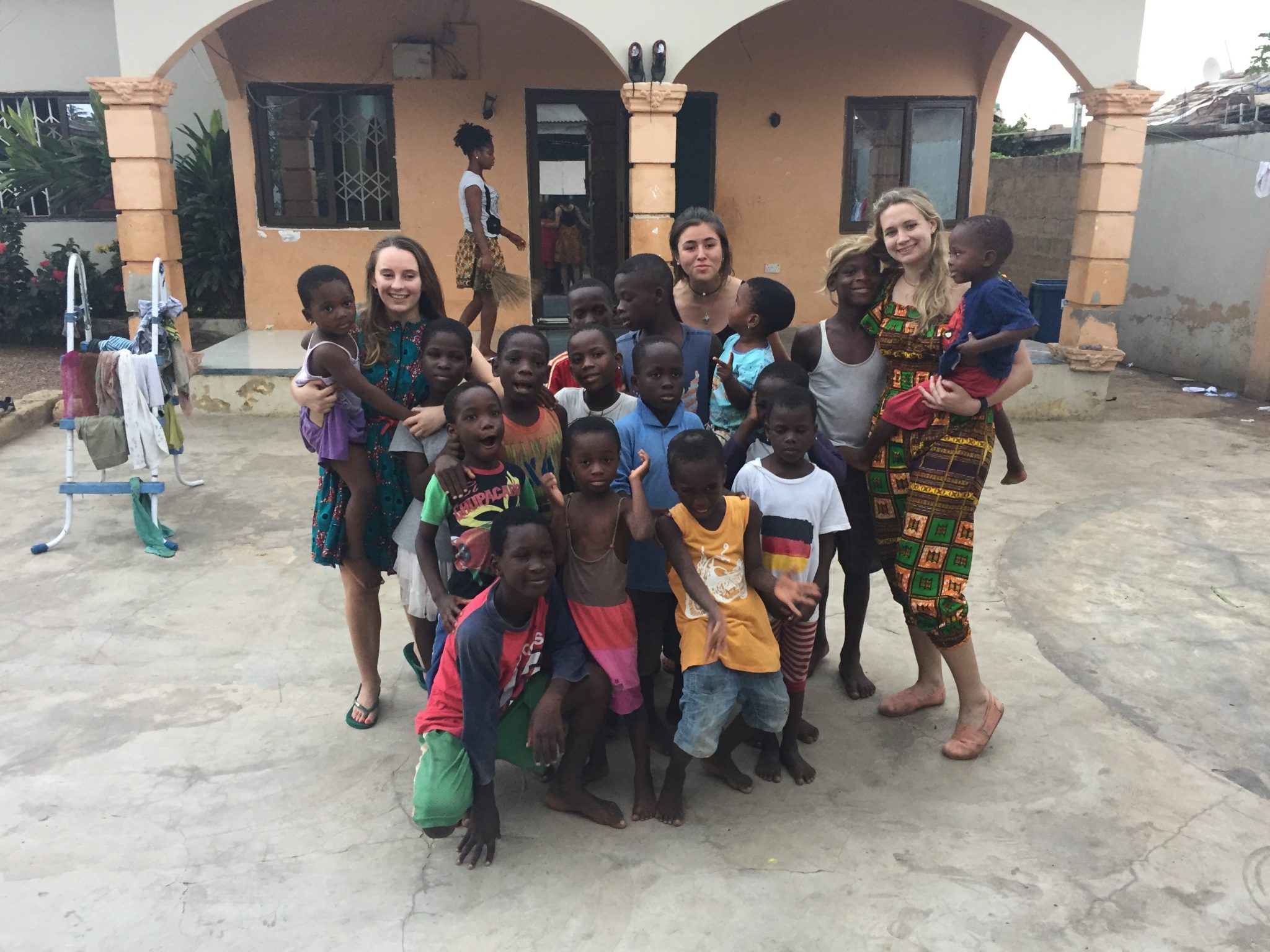 Group photo of participants and children