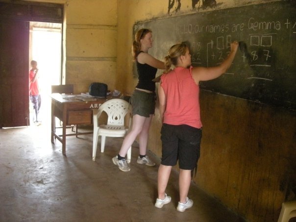 Participants writing on a chalkboard