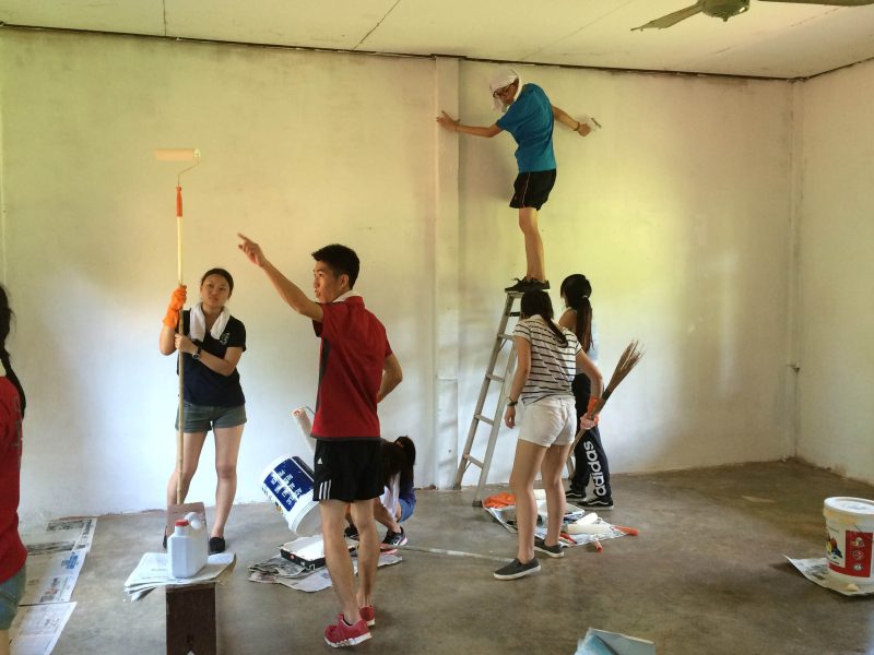 Painting a classroom's wall