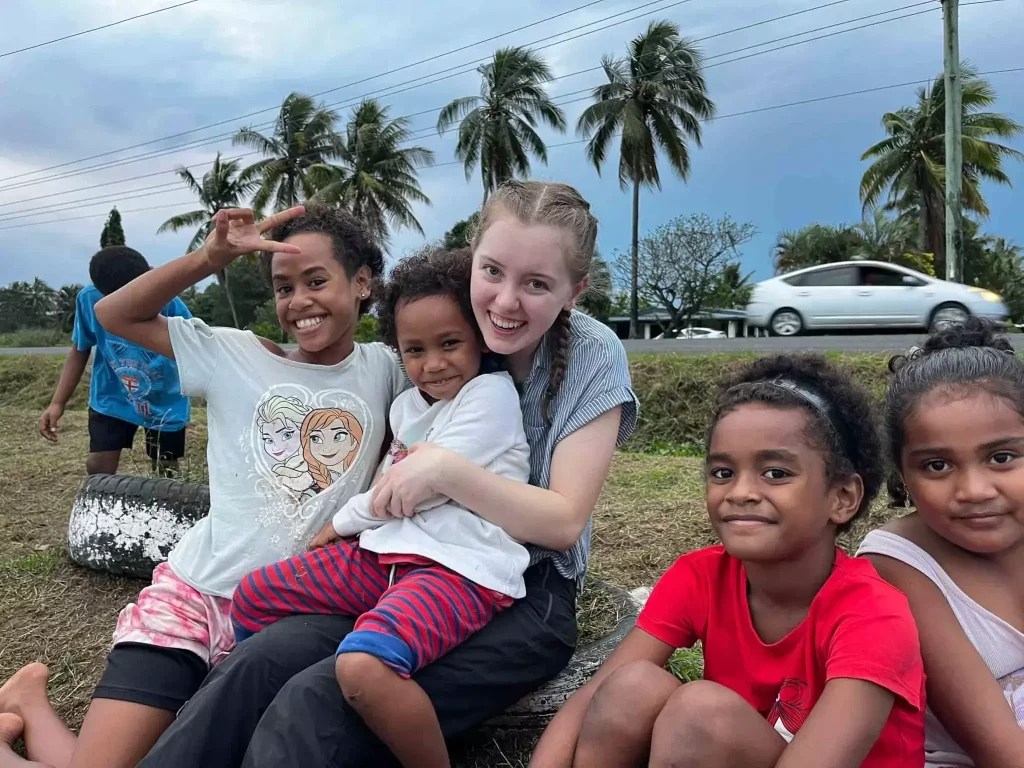sitting-with-the-kids-in-Fiji-scaled