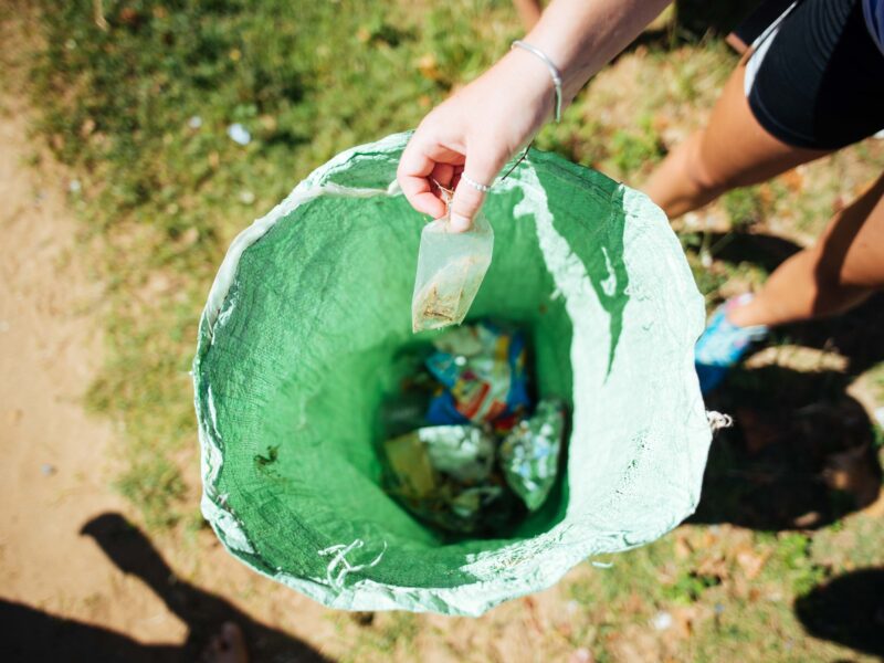 picking up trash on beach