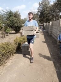 carrying bricks