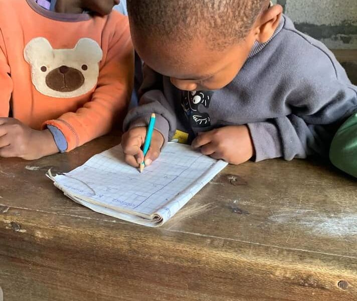 child doing his work