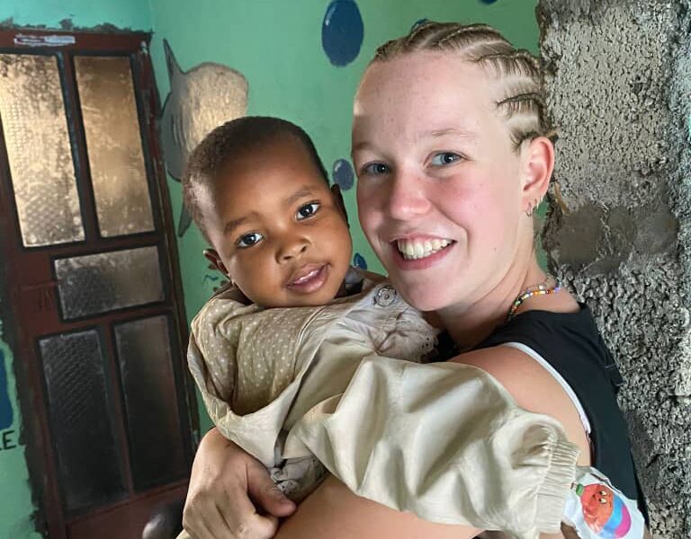 pic with young child at arusha kindergarten