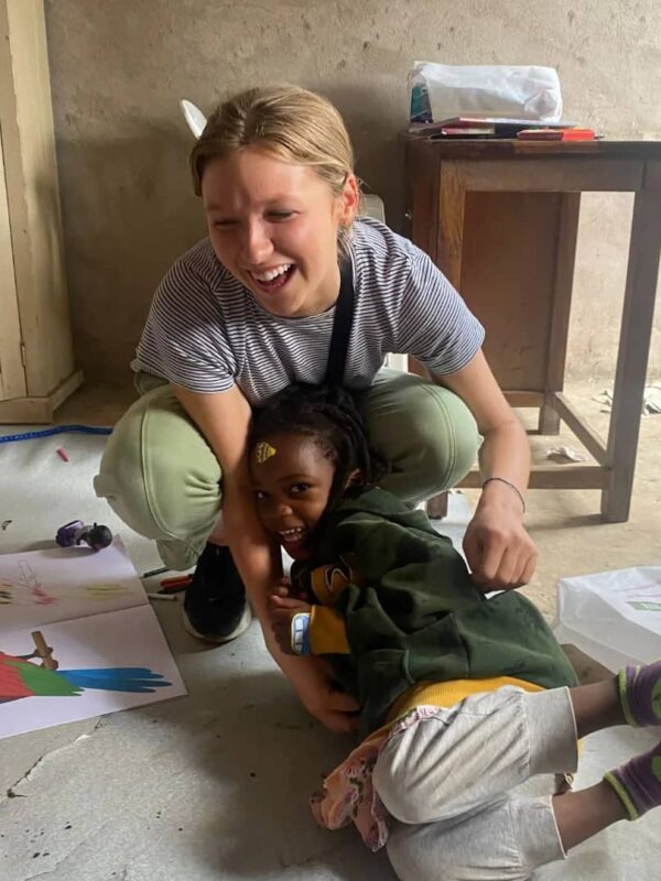 playing with child in tanzania