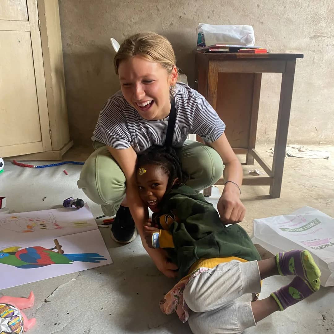 playing with child in tanzania