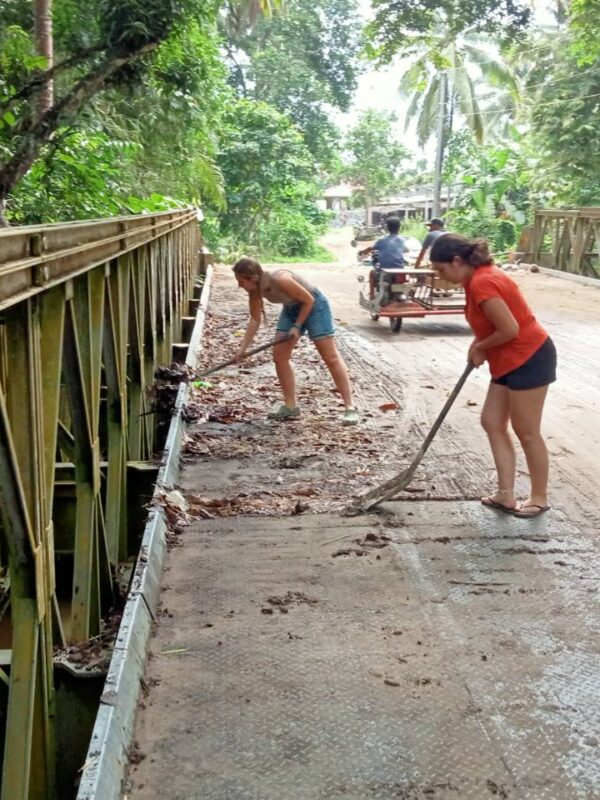 sweeping the road