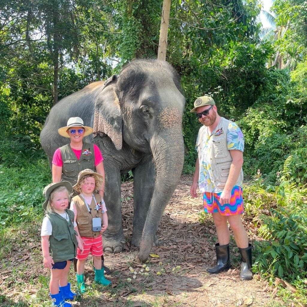 family with elephant