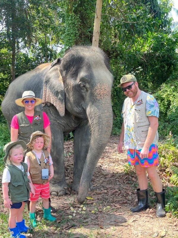 family with elephant