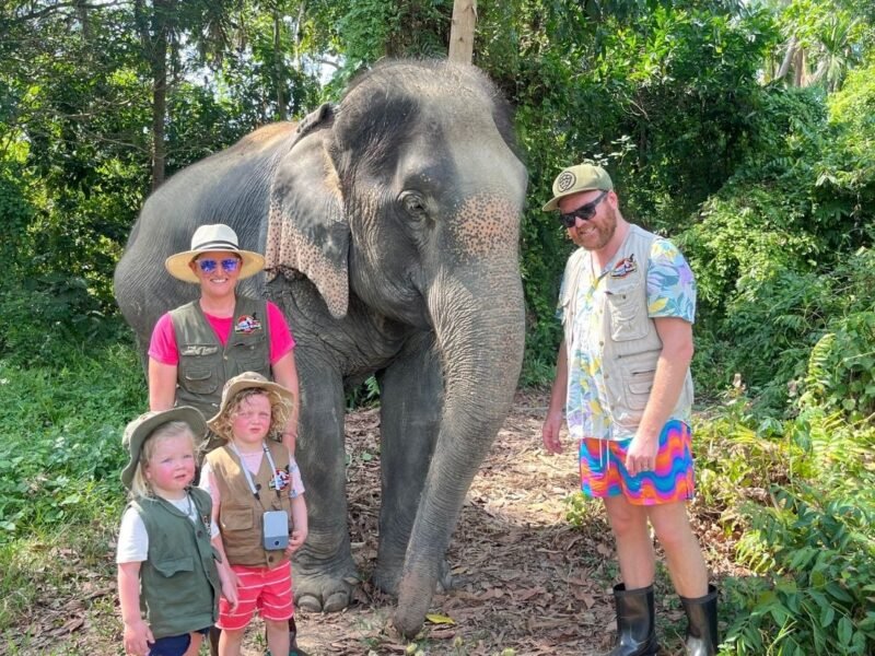 family with elephant