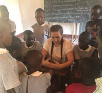 Participant talking with kids