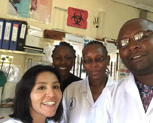 Group photo of doctors with volunteer medical student in kenya