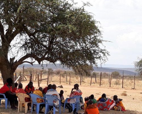 KE Mara Womens group gather under tree