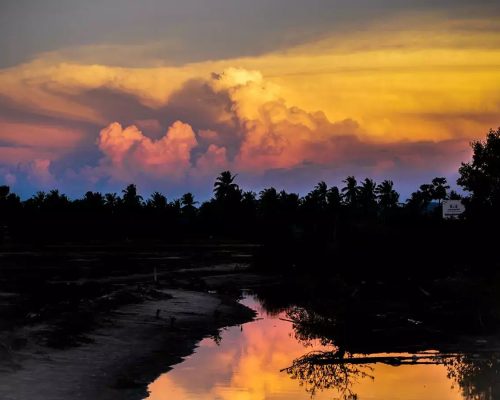 Kampot-sunset-over-river-min-1