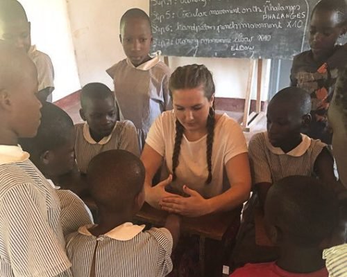 Participant talking with kids