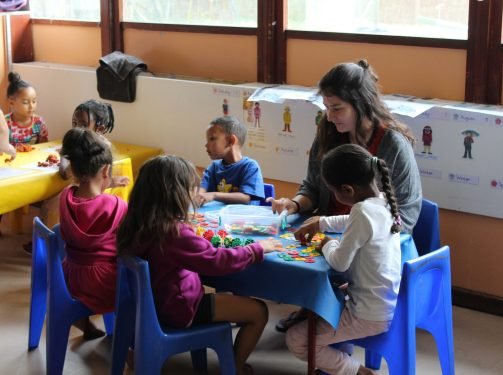 with kids at table