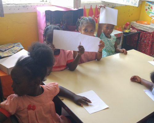 kids doing work at desk Cape Verde