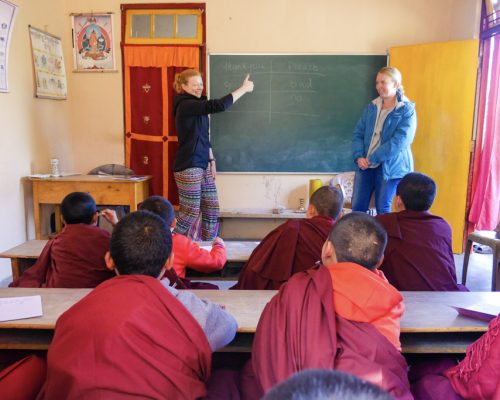 teaching monks in classroom
